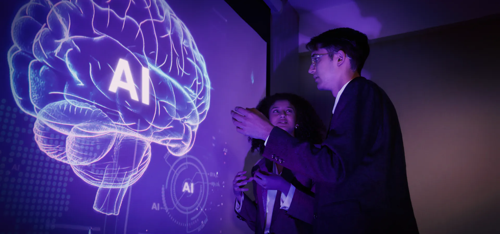 AI & Machine Learning: team reviewing a holographic AI brain display