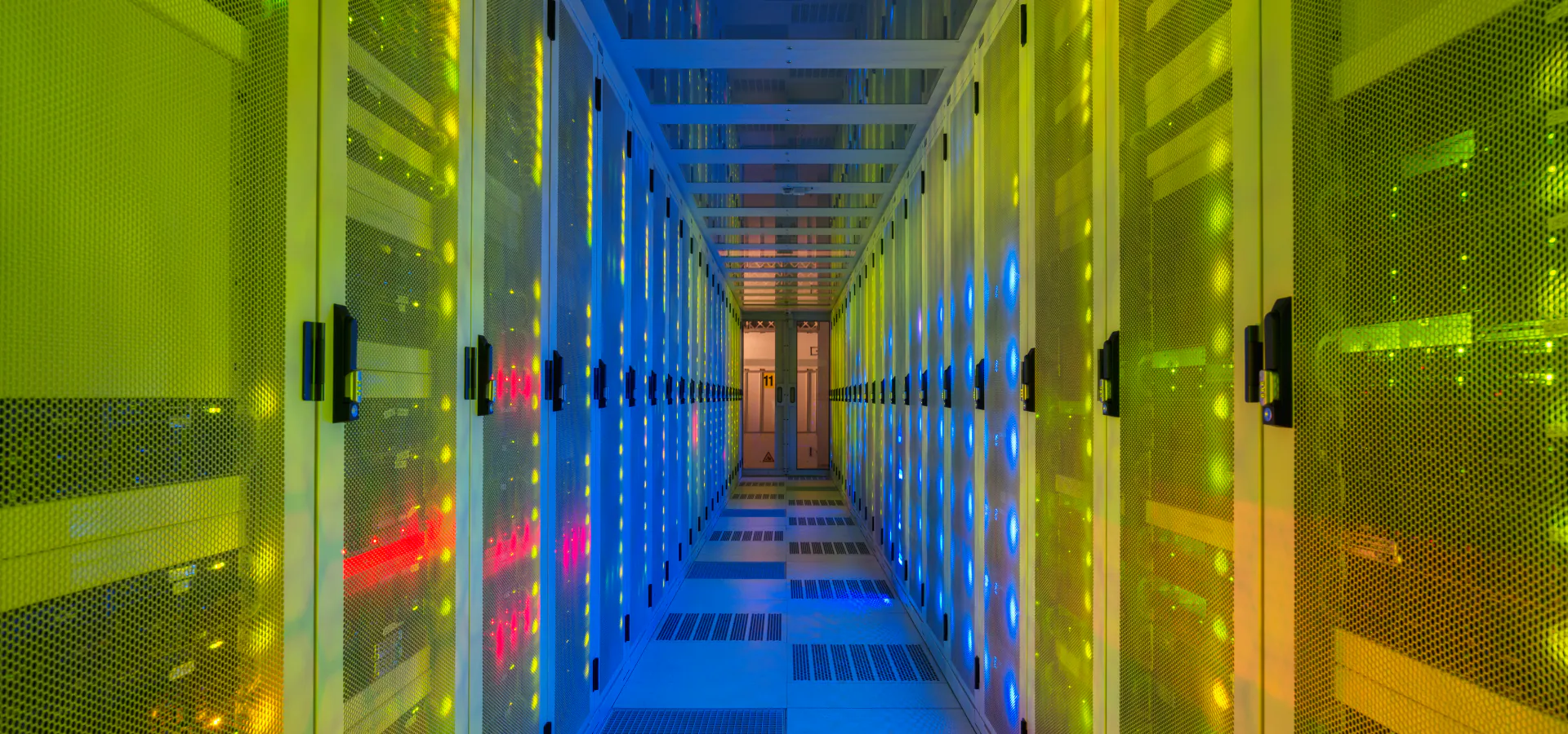 Enterprise Cloud Deployment Services: colorful corridor between data center server racks