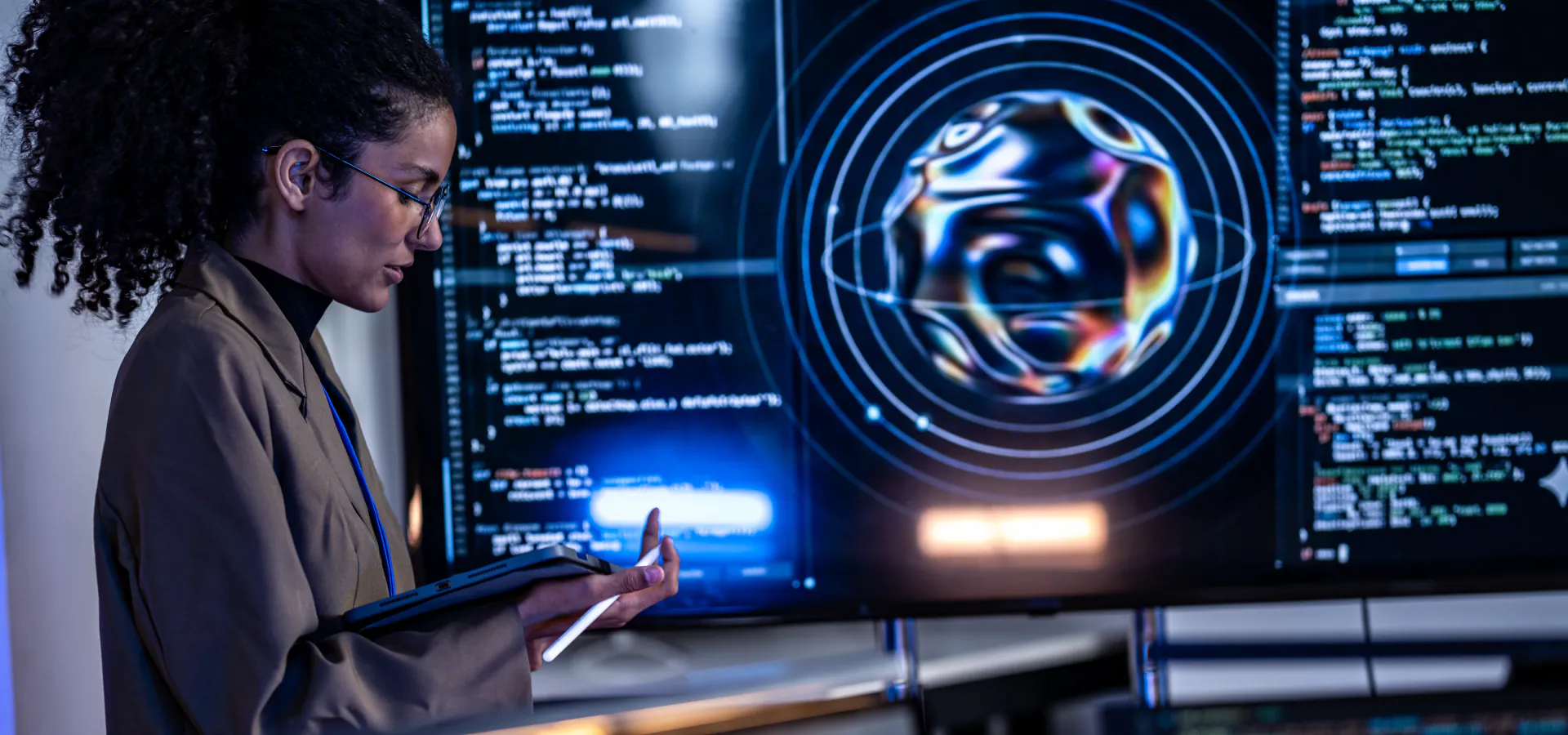 Top SailPoint Identity | Access management IAM | Identitynow Consulting company Top SailPoint Identity | Access management IAM: security analyst with a tablet in front of threat-monitoring screens