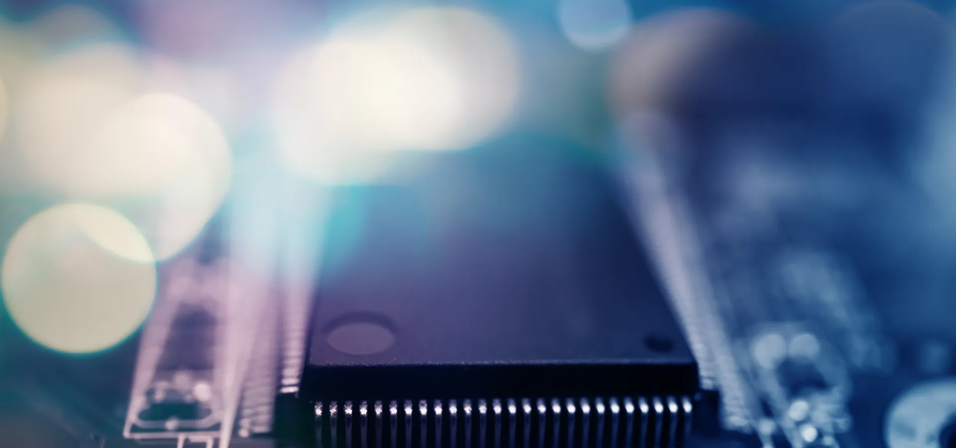 World-Class Blockchain Consulting Services for Enterprises: microchip on a circuit board with soft light